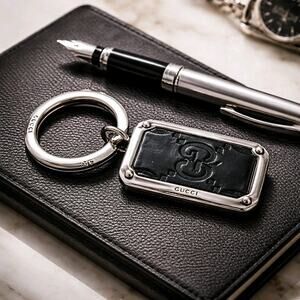 Gucci Guccissima GG Leather Dog Tag Keychain Silver Tone Made in Italy